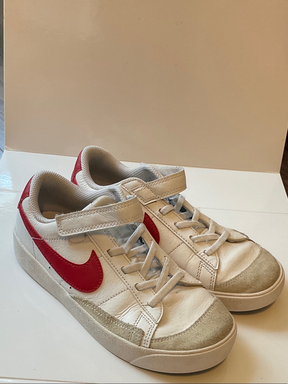 Nike Kids White Sneakers with Red Swoosh